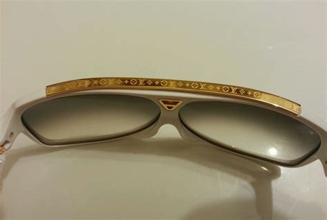 lv evidence sunglasses real v fake|louis vuitton false product id.